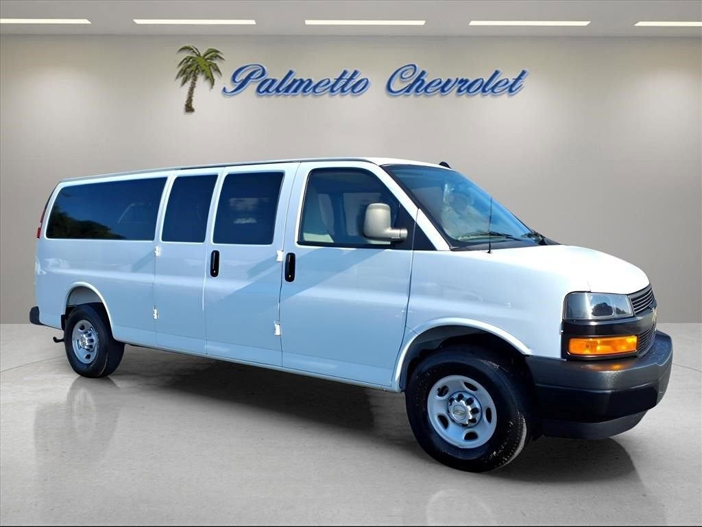 2025 Chevrolet Express Passenger 1LS in Summit White — front three-quarter view