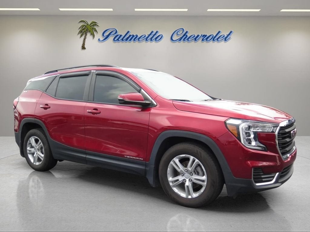 2023 GMC Terrain SLE in Volcanic Red Tintcoat — front three-quarter view