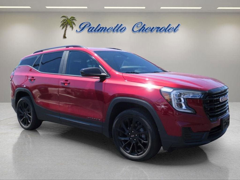 2023 GMC Terrain SLE in Volcanic Red Tintcoat — front three-quarter view