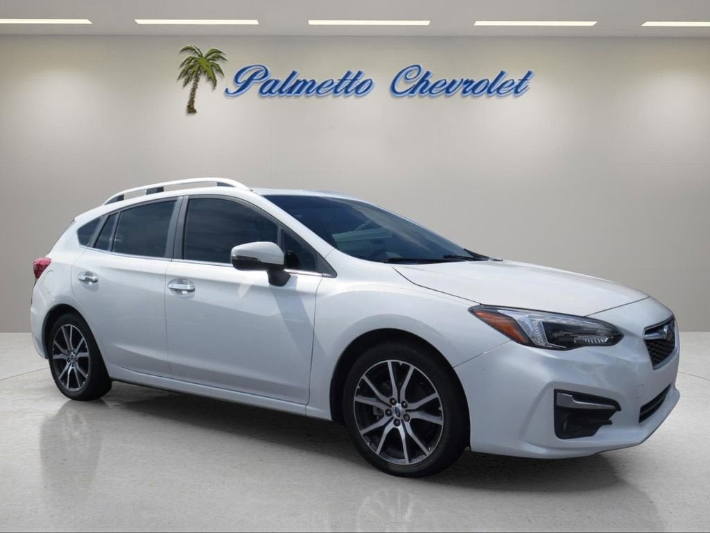 2018 Subaru Impreza 2.0i Limited in White — front three-quarter view